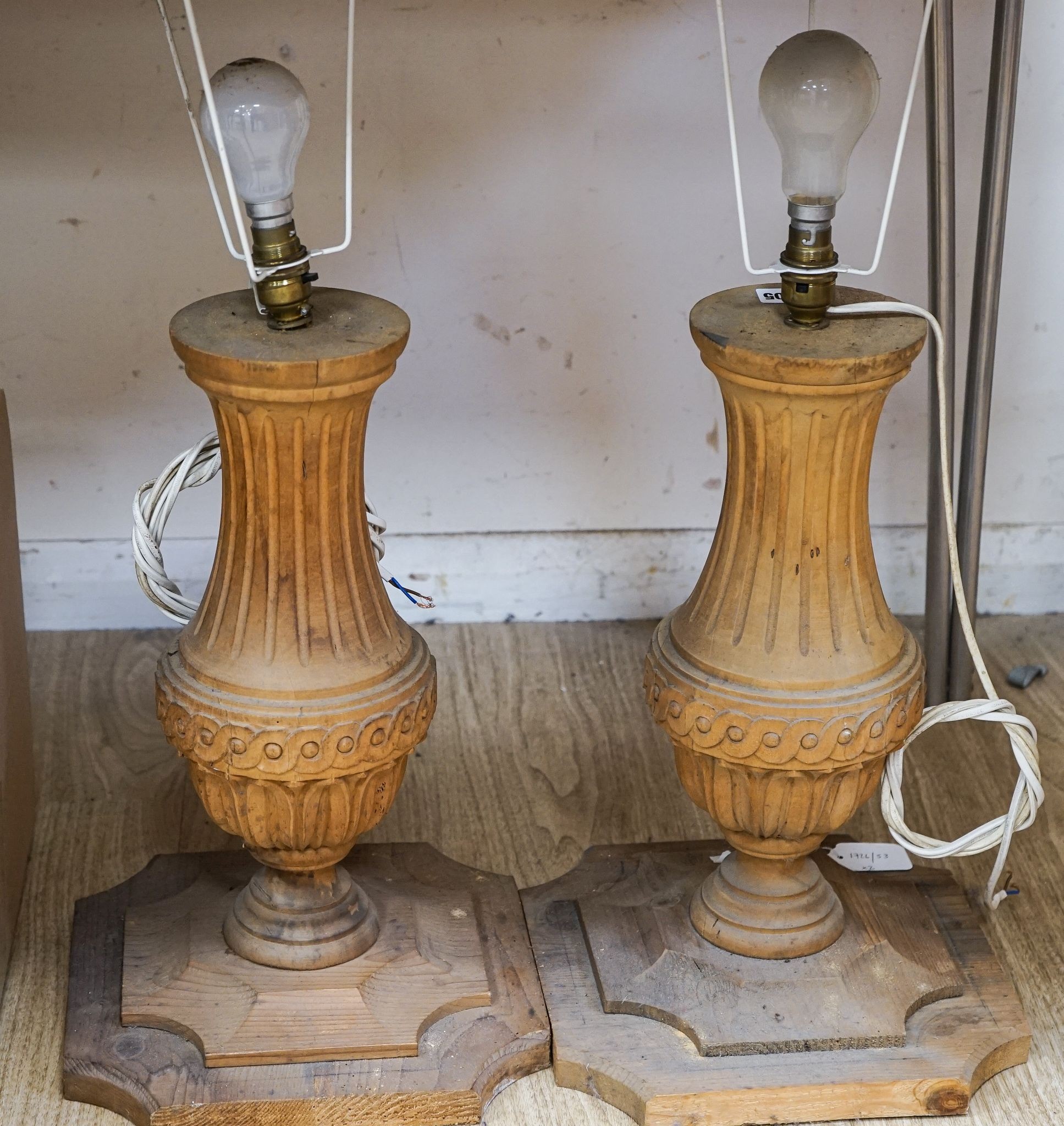 A pair of modern pine and beech carved classical vase form lamps, height 45cm